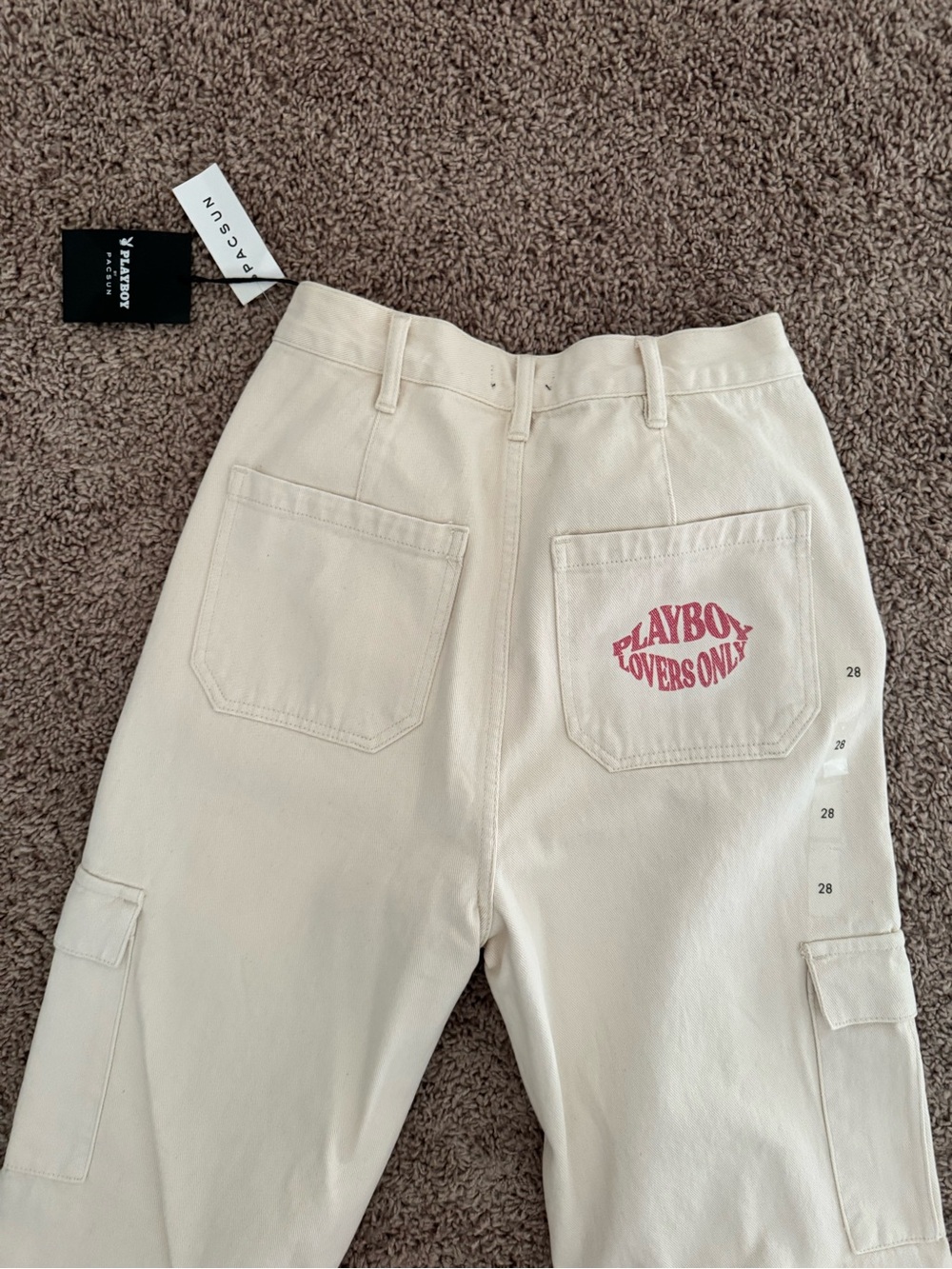 PacSun Cream Flare Wide Leg Jeans with Pink 'Playboy Lovers Only' Print
